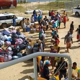 Mormon_missionaries_unload_goods_at_Haapai_2E